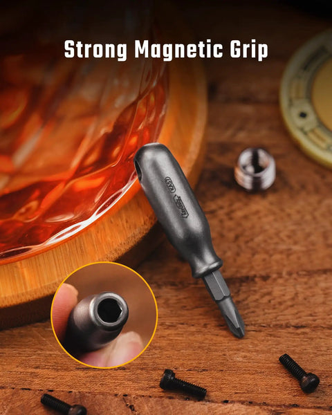 Rock Solid Premium Titanium Mini Screwdriver Featuring Super Magnetic Replaceable Bits And Rapid Phillips Flathead Swaps For Trustworthy Daily Use Everywhere with strong magnet on wooden surface.