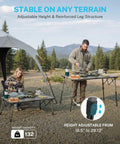 Outdoor scene with a family using a 50 Inch Camping Table With Adjustable Height Legs For Uneven Ground on rocky terrain.