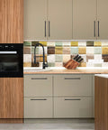 Modern kitchen scene with Matte Black 10 Inch Cabinet Handles Set For Kitchen Cabinets Stainless Steel Drawer Pulls installed on cabinets.