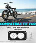 Rock Solid 20W 6500K LED Headlight for Electric Bikes and ATVs, mounted on black electric bike by the beach road
