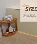 Wood Corner Shower Bench With Storage Shelf For Tight Bathrooms in corner with towels and toiletries.