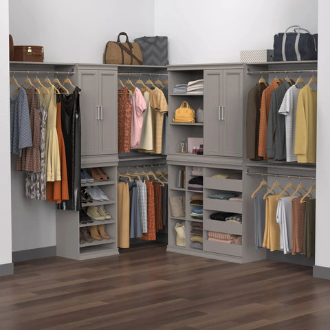 Super Slick Modular Closet Storage Organizer With Four Stackable Drawers In Taupe featuring organized clothing and accessories in a clean closet.