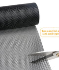 Pet Proof Window Screen Replacement 60 By 100 Inches Thick Charcoal Fiberglass Mesh being cut with scissors, showcasing custom sizing.