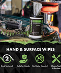 NatureGrit hand and surface wipes canister on a car hood in a workshop; green label, 72-count.