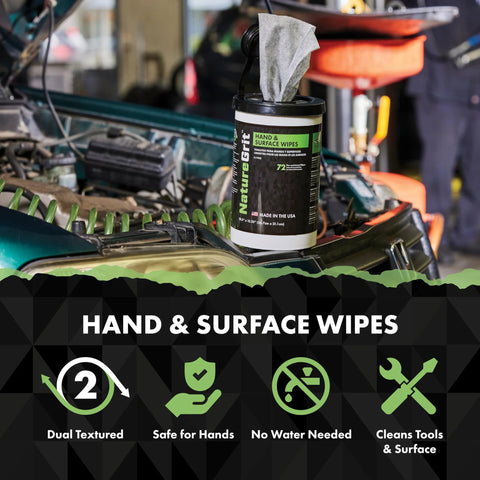NatureGrit hand and surface wipes canister on a car hood in a workshop; green label, 72-count.
