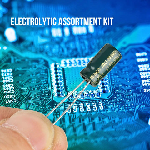 Top Shelf Audio Capacitor Assortment Kit 100 Pieces Of Durable Electrolytic Radial Capacitors 10Uf Through 470Uf And 10V Through 63V Voltage Range in hand over circuit board.