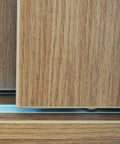 Heavy Duty Sliding Door Rollers Four Pack With Silky Nylon Wheels And Tough Steel Mounts for closet tracks in wood finish.