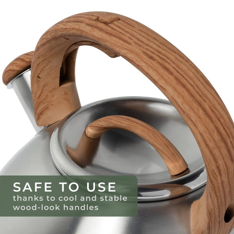 Stovetop Whistling Tea Kettle Two Point Four Quart Stainless Steel For Induction And Gas Stovetops with wooden handle close-up