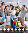 Group enjoying Totally Party-Ready Portable Bluetooth Karaoke System with two wireless mics and LED lights at home party