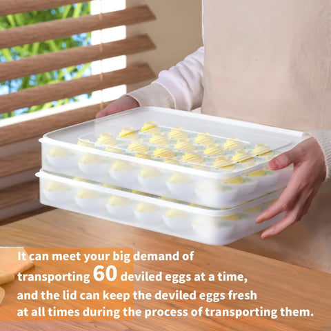 Person holding two pack large capacity deviled egg carrier tray with lids holds 60 eggs total clear plastic egg holder for fridge.