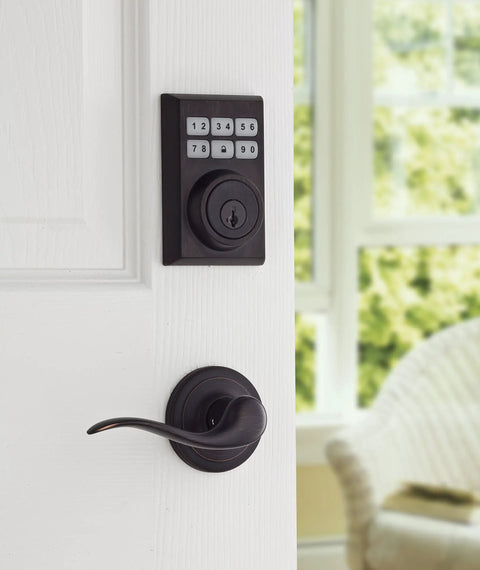 SmartCode Electronic Door Deadbolt 99090-023 With Smart Key Venetian Bronze Finish Keyless Entry on white door