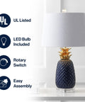 Navy Blue And Gold Pineapple Ceramic Table Lamp For Bedroom Decor With White Linen Drum Shade And LED Bulb Modern Whimsical Bedside Nightstand Light Includes Energy Saving LED Bulb Dope Vibe with UL listed features and rotary switch.