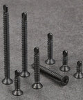 300 Pack Size 8 By One Inch Sheet Metal Self Tapping Screws Black Stainless Steel Flat Head in various sizes arranged on gray surface.