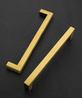 Brushed Brass Square Cabinet Handles With 6 1 4 Inch Center To Center Spacing Heavy Duty Kitchen Drawer Pulls And Vanity Hardware on black background.