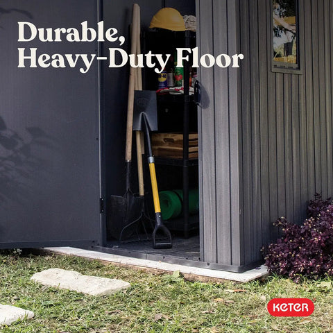 Lockable Resin Outdoor Storage Shed Graphite Gray Four By Six Feet showing durable heavy-duty floor and garden tools inside.