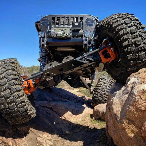 Heavy Duty Chromoly Heim Joint Kit Built Different For Weekend Warrior Utv Builds includes rugged vehicle climbing rocks.