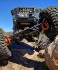 3/4 Inch Chromoly Heim Joint Kit Beasts Mode 3/4 By 16 Threads showcased on UTV navigating rocky terrain.