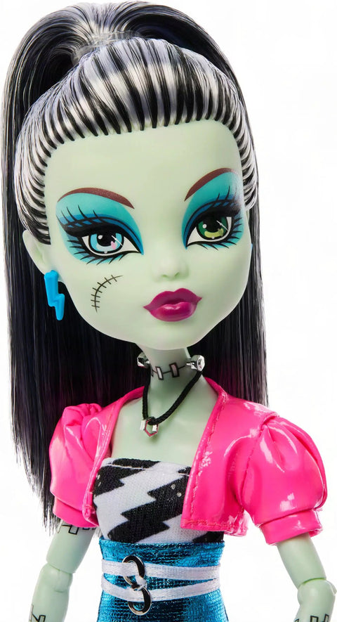 Fresh Frankie Stein Reproduction Doll From The Iconic Dawn Of The Dance Lineup featuring side view, sleek black and white dress, pink shrug.
