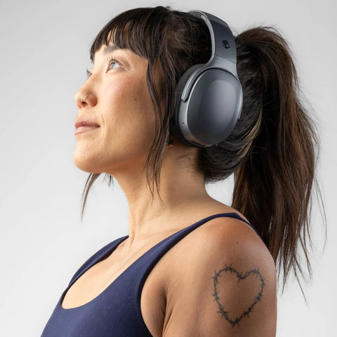 Person wearing Crusher 540 Active Wireless Bluetooth Over Ear Headphones With Multi Sensory Bass Noise Isolation Sweatproof Build
