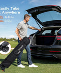 Man loading 10x10 Pop Up Canopy With Center Lock One Push Instant Setup And No Fuss Wheeled Outdoor Gazebo into car trunk.