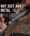 Hands using 21 Double Ended Screwdriver Bits Bit Kit For Multi Tools Ready For Any Job on a wooden surface