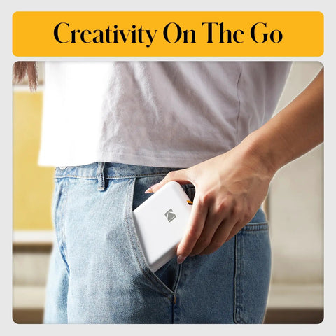 Step Instant Smartphone Photo Printer On The Go Portable Mini Color Wireless Printer fitting into a pocket