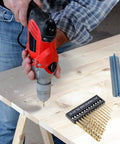 Person using drill with Titanium Coated Drill Bit Set With Hex Shank And 135 Degree Tip High Speed Steel Drill Bits nearby.
