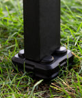 Quarter Inch Griddle Leveling Shims Kit Four Pack Leveler Tool stabilizing grill leg on grass