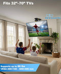 Motorized Drop Down Ceiling TV Mount Fits 32 To 70 Inch Screens With Wireless Remote Holds Up To 88 Lbs Heavy Duty Electric Lift Bracket mounted in a modern living room.
