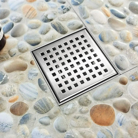 Square Shower Drain 4 Inch Brushed 304 Stainless Steel Dual Filter Fast Water Flow Rust Proof on pebble floor