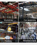 Spring Balancer Tool Hoist Stand With Manual Lock Adjustment And Power Tool Weight Slinger in automotive workshop setting.