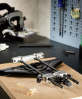 Universal Micro Adjustable Router Guide With Precision Straight Edge Fence for nailing down exact cuts on wood.