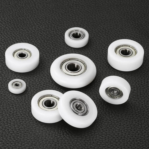 Eight Piece 608ZZ Double Shielded Nylon Ball Bearing Rollers designed for smooth glide in drawer slides, white with metal inner races.
