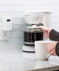 Plug In Digital Timer With Two Grounded Outlets And Seven Day Programming by coffee maker in a kitchen setup, easy automation.