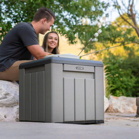 Versatile Outdoor Storage Cube Deck Box Doubles As Cozy Bench Seat And 25 Gallon Capacity Weather Resistant Patio Organizer on outdoor patio.