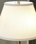 Close-up of linen shade on Spyglass Table Lamp With Antique Brass Finish Dope Retro Modern Classic Vibe 30.5 Inch Tall