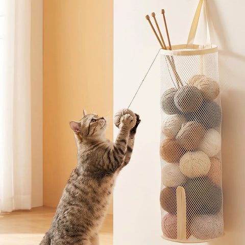 Round Hanging Mesh Sock Storage Bag With Nylon Pockets For Closet Door Organization And Dorm Room Essentials Quick Access Laundry Solution To Keep Your Socks Legit Neat And Pretty Dang Slick with yarn balls and cat.