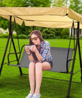 Person sitting on swing with Thick 600D Oxford Waterproof Swing Seat Cover Replacement For 3 Seat Outdoor Patio Garden Benches Cushions Protection Gray 58.2 19.7 19.7 Inches Heavy Duty Stitching All Weather Rainproof