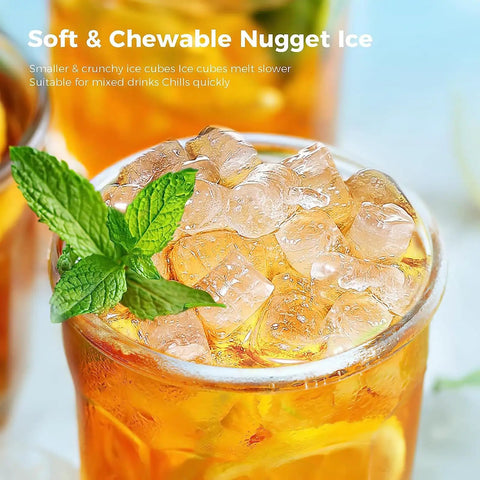 Close-up of soft chewable nugget ice in a glass, ideal for drinks, from the Countertop Nugget Ice Maker Delivers 34 Pounds Daily With One Touch Control And Self Clean Wash For No Sweat Party Hosting And Home Kitchens Office Lounges Or Road Trip Adventures.