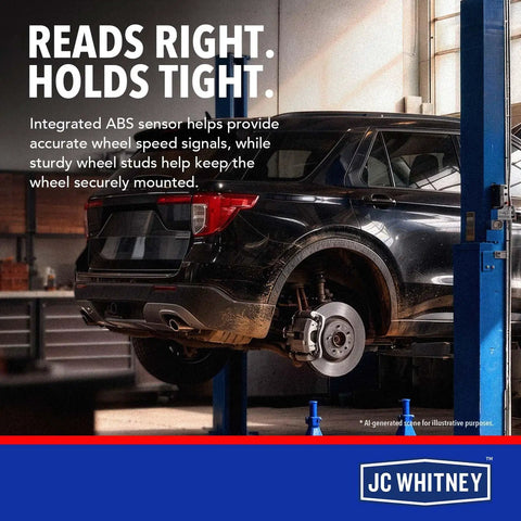 Heavy Duty Wheel Bearing And Hub Assembly With Abs Fits Ford Explorer And Sport Trac Plus Mercury Mountaineer on vehicle lift in garage.