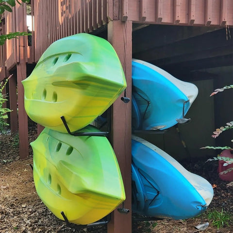 Top Shelf Badass Kayak Wall Mount Rack For Garage Storage securely holds two kayaks with a sturdy steel design.