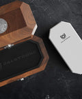 All In One Knife Sharpening Kit With Dual Grit 1000 6000 Whetstones Portable Oak Box open on dark surface