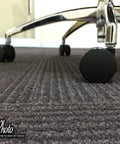Slick Rolling 2 Inch Nylon Twin Wheel Heavy Duty Furniture Casters shown on carpet, designed for smooth movement and durability.