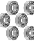 Slick Spindle Bearings Repair Kit Compatible With John Deere Bobcat Snapper Troy Bilt Lawn Tractors six sturdy metal spindle bearings.