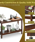 All Weather Patio Bar Table And Console With Two Shelves, 48 Inch Solid Wood Indoor Outdoor Multipurpose Buffet Storage Organizer depicted with sturdy solid wood design and decorative items, showcasing espresso finish and adjustable feet.