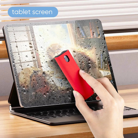 Using 6 Pack Screen Cleaner Kit 2 In 1 Touchscreen Mist Cleaner, Spray And Wipe With Microfiber Cloth on a tablet screen.