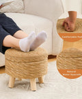 Handwoven Natural Seagrass Storage Ottoman Poufs Round Footrest Stool With 4 Wood Legs Comfy Padded Outdoor Seat Cozy Hidden Storage Perfect For Hallway Living Room Bedroom Garden shown in living room with person's feet resting on it