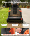 Heavy Duty Push Lawn Sweeper With 30 Inch Wide Broom And 12 Cubic Foot Hopper Bag For No Sweat Grass And Leaf Pickup Across Big Lawns Patios Sidewalks And Driveways in use on grass and concrete.