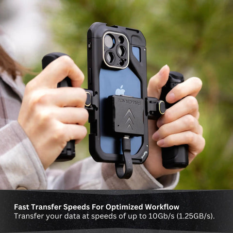 Person using CFexpress Type A Single Slot Mobile Card Reader With USB C 3.2 Gen 2 on iPhone for data transfer.