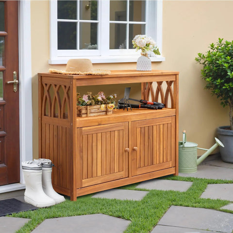 Weatherproof Acacia Wood Outdoor Storage Cabinet With Two Magnetic Doors And Three Level Storage in garden setting